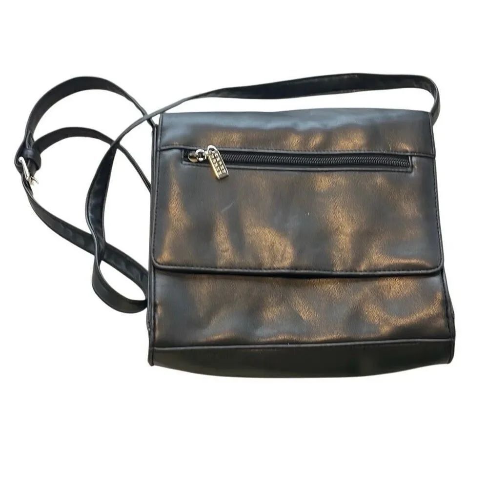 ￼ crazy horse by Liz Cleburne Crossbody bag